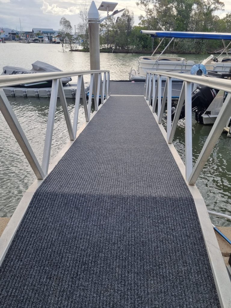 Marine carpet installed on a wharf